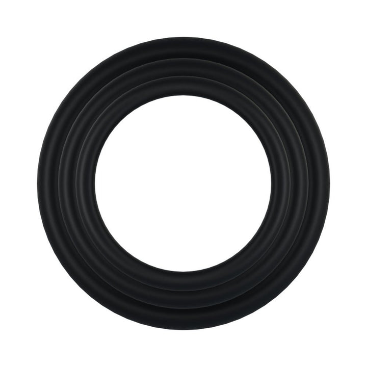 Three black rubber gaskets in varying sizes arranged concentrically on a white background.