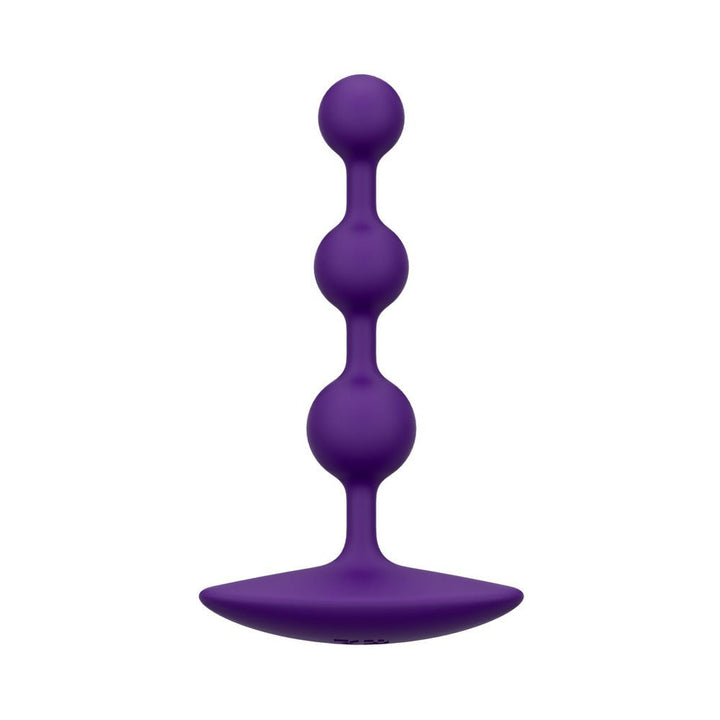 Dark purple silicone anal plug with three graduated beads and a flat base for comfortable use.