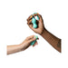 Hands holding a light teal ROMP Cello rechargeable silicone G-spot vibrator and its remote control against a white background.