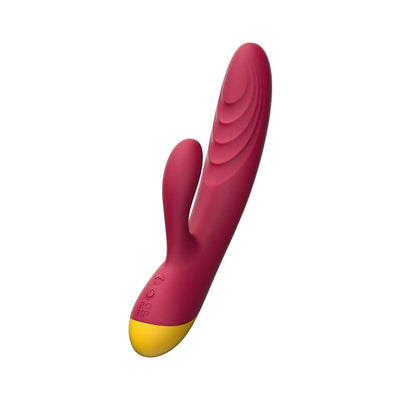 Magenta and yellow dual-stimulation rabbit vibrator with textured shaft and two-button control panel.