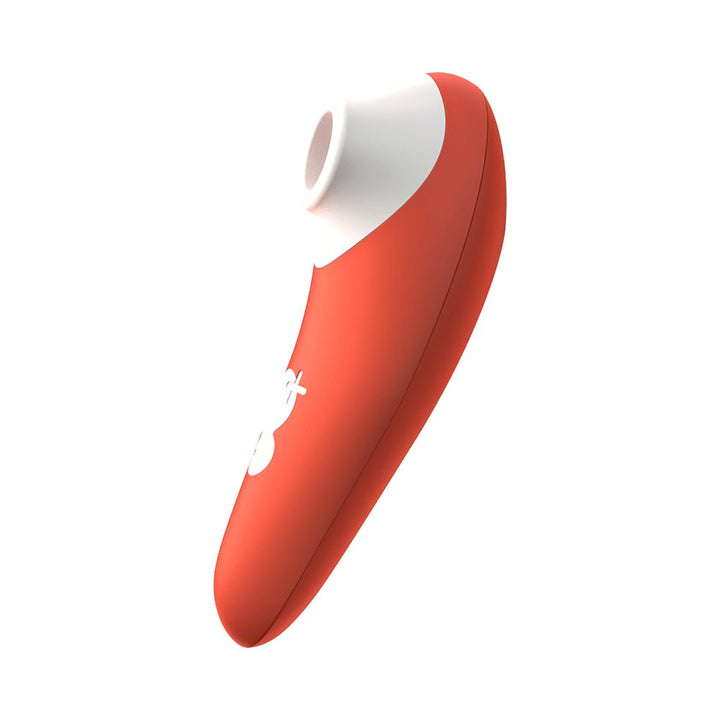 Orange and white clitoral air pulsator with ergonomic design and two-button control panel.