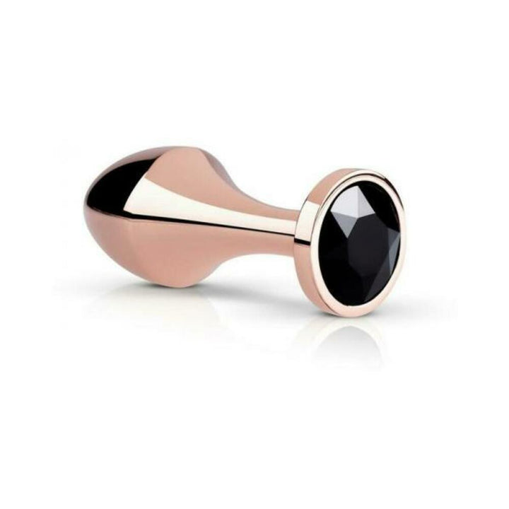 Rosy gold aluminum butt plug with a smooth tapered shape and a black faceted crystal base on white background