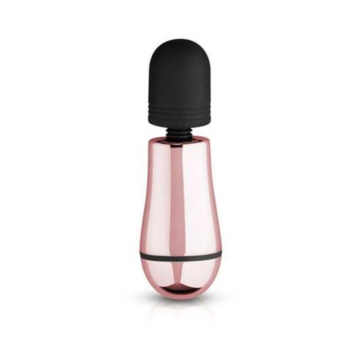 Compact rosy gold mini massager with a soft black silicone head and sleek ergonomic design.