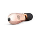 Compact rosy gold mini massager with soft black silicone head and single button control, USB rechargeable and travel-ready.