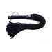 Black suede flogger with multiple soft straps and a wrapped leather handle with wrist loop.