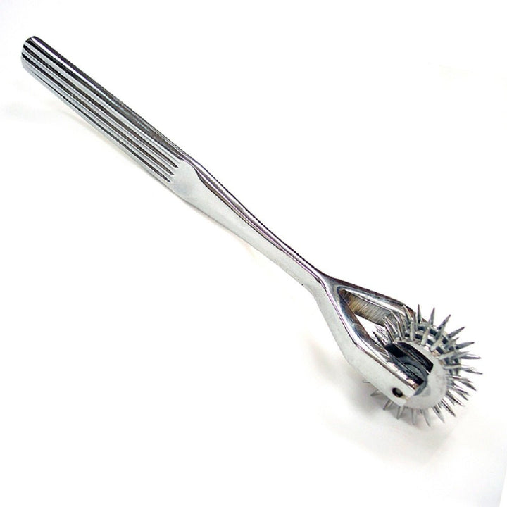 Nickel-plated triple rotating pinwheel with spiked wheels and textured handle for sensory stimulation.