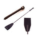 Black leather riding crop with wrapped handle and flat leather tip on a white background.