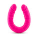 Bright pink double-ended silicone dildo with a slim, curved design and textured surface.