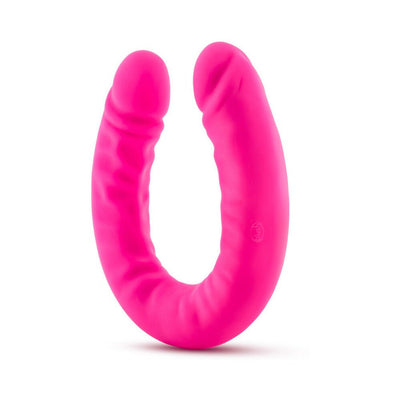 Bright pink double-ended silicone dildo with slim, textured design and realistic detailing.