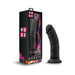 Black curved realistic dildo with suction cup base next to colorful Ruse Jammy packaging box.