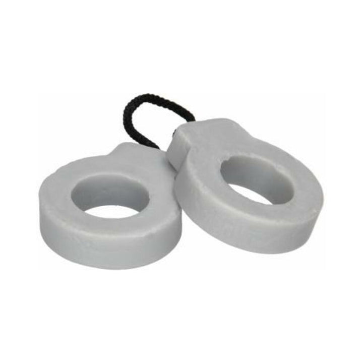 White soap shaped like handcuffs connected by a black rope loop for hanging or handling.