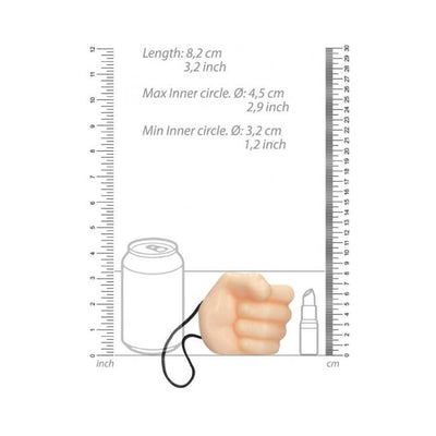 Compact fist-shaped soap on a rope shown next to a soda can and lipstick for size comparison with measurement scales.