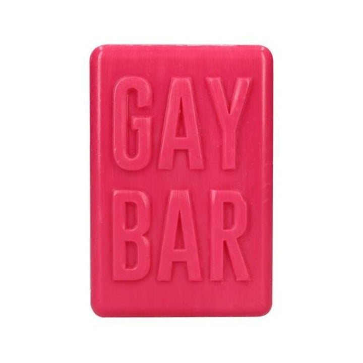 Bright pink rectangular soap bar embossed with the words GAY BAR in bold letters