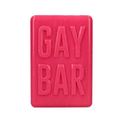 Bright pink rectangular soap bar embossed with the words GAY BAR in bold letters