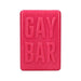Bright pink rectangular soap bar embossed with the words GAY BAR in bold letters