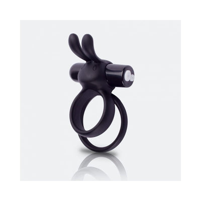 Black wearable rabbit vibrator ring with dual vibrating ears and dual rings on a reflective surface