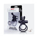 Black rechargeable wearable rabbit vibrator with double ring and USB charging cable displayed next to its packaging.