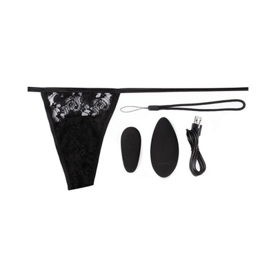 Black lace thong panty with ergonomic remote control, vibrating insert, and USB charging cable on white background.