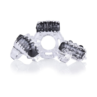 Clear and black textured vibrating ring and mini vibes set for couples enhancing intimate pleasure.
