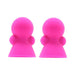 Pair of bright pink silicone Seduce Me nipple suckers with rounded bulb design on white background.