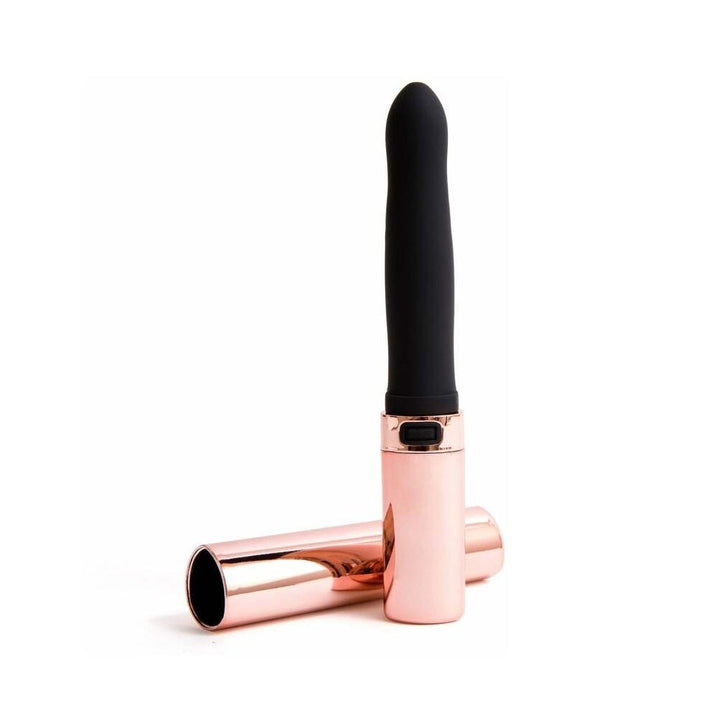 Sleek black silicone vibrator with rose gold metallic cap, standing upright beside its matching cover on white background.