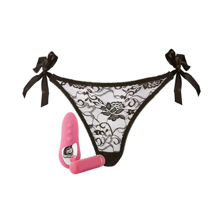 Black lace panty with side ties paired with a pink rechargeable bullet and remote control set on white background.
