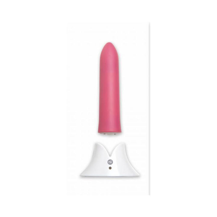 Pink rechargeable silicone bullet vibrator with tapered tip and white magnetic USB charging base on white background.