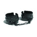 Black vegan leather handcuffs with soft black fur lining and a connecting chain, designed for comfort and style.