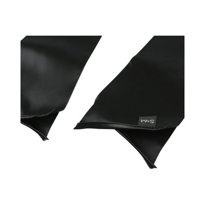 Close-up of two black silky sashes with smooth texture and subtle S&M logo tag on one end.