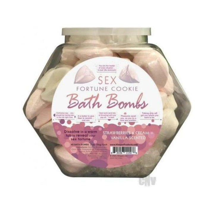 Clear fishbowl container filled with pink and white sex fortune cookie bath bombs, strawberries and cream scented.