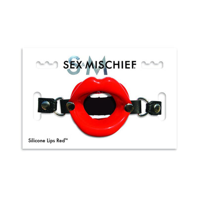 Red silicone mouth gag shaped like lips with adjustable black vegan leather straps on white packaging.
