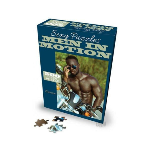 Box of Sexy Puzzle "Men in Motion" featuring a muscular man with sunglasses on a motorcycle, 500-piece puzzle.