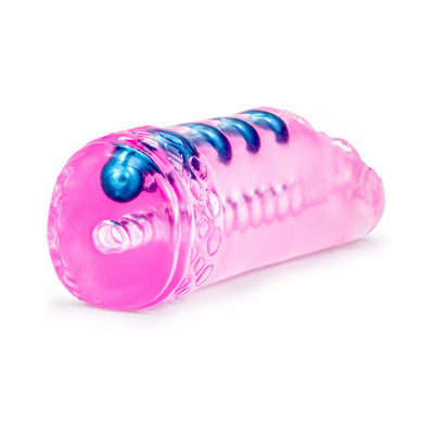 Compact pink textured male pleasure sleeve with blue internal beads and ribbed design for enhanced stimulation.