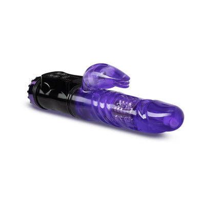 Purple translucent rabbit vibrator with textured shaft and black control base on white background