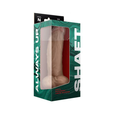 Realistic 9.5-inch liquid silicone dildo with balls in pine color, displayed in green and white packaging with clear window.