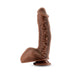 Realistic dual-density silicone dildo in dark brown with detailed veins and textured base on white background.
