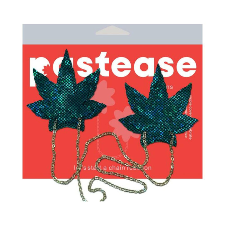 Shattered glass disco ball green weed leaf nipple pasties connected by a gold chain on red Pastease packaging.