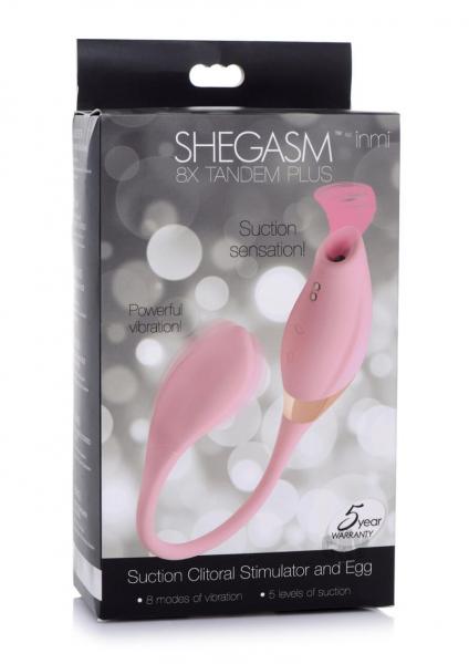 Pink Shegasm 8x Tandem Plus silicone clitoral stimulator and vibrating egg with flexible connecting cord in retail packaging.