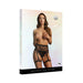 Packaging of Shots Le Desir Kiss black fishnet garterbelt with kisses pattern, modeled on a woman covering her chest.