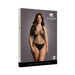 Plus-size model wearing black strappy lace teddy with halter neck on product packaging for Le Desir collection.