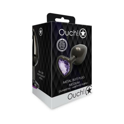 Packaging box of Shots Ouch! medium gunmetal metal butt plug with amethyst purple heart-shaped jewel base.