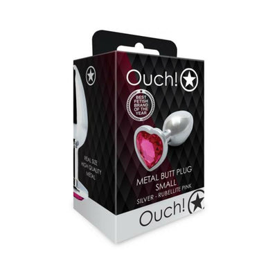 Packaging box of Shots Ouch! small silver metal butt plug with a pink heart-shaped gem base.