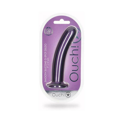 Metallic purple smooth silicone 7-inch G-spot dildo with suction base in clear packaging on purple background.