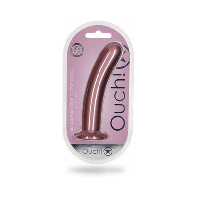 Rose gold smooth silicone 7-inch G-spot dildo with suction base in clear packaging labeled Ouch!