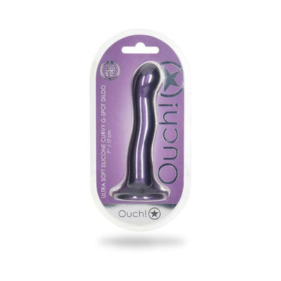 Metallic purple 7-inch ultra-soft silicone curvy G-spot dildo with suction base in clear packaging.