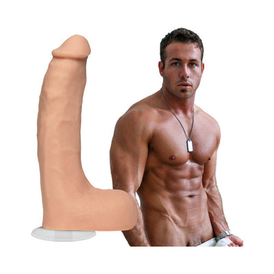 Realistic 8.5-inch Ultraskyn dildo with suction cup base beside a shirtless muscular male model.