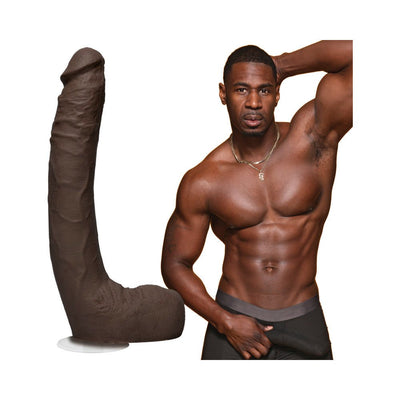 Chocolate-colored 10-inch realistic curved dildo with suction base next to a muscular shirtless man posing.