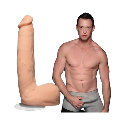 Vanilla-colored 9-inch lifelike dildo with suction cup next to shirtless male model in gray underwear.