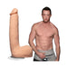 Vanilla-colored 9-inch lifelike dildo with suction cup next to shirtless male model in gray underwear.