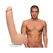 Realistic 9-inch Ultraskyn dildo replica of Xander Corvus with suction base shown next to shirtless male model.
